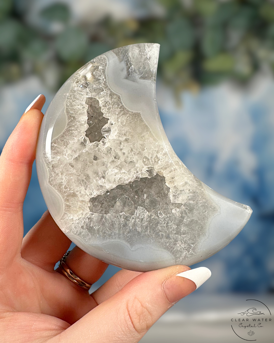 Celestial Captivation: Brazilian Druzy Agate Moon on Stand