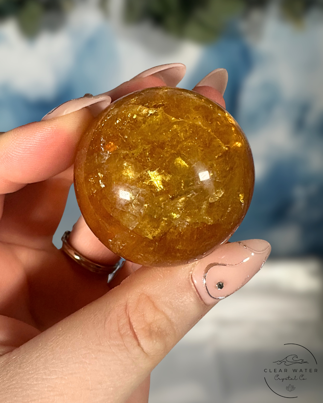 Golden Radiance: Yellow Fluorite with Mica Spheres