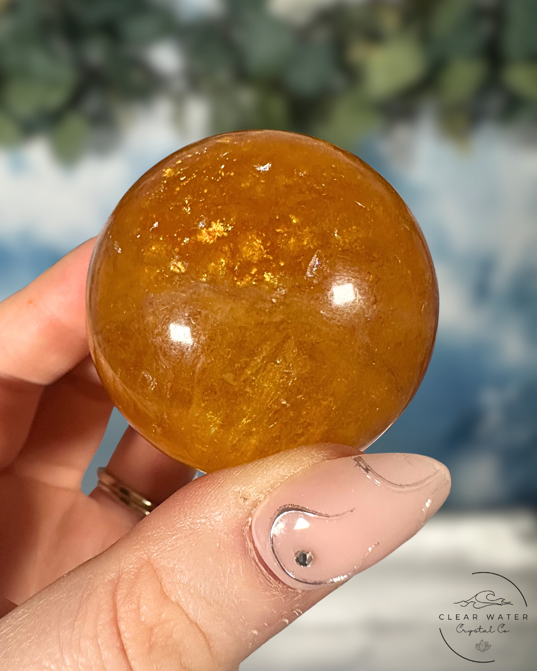 Golden Radiance: Yellow Fluorite with Mica Spheres
