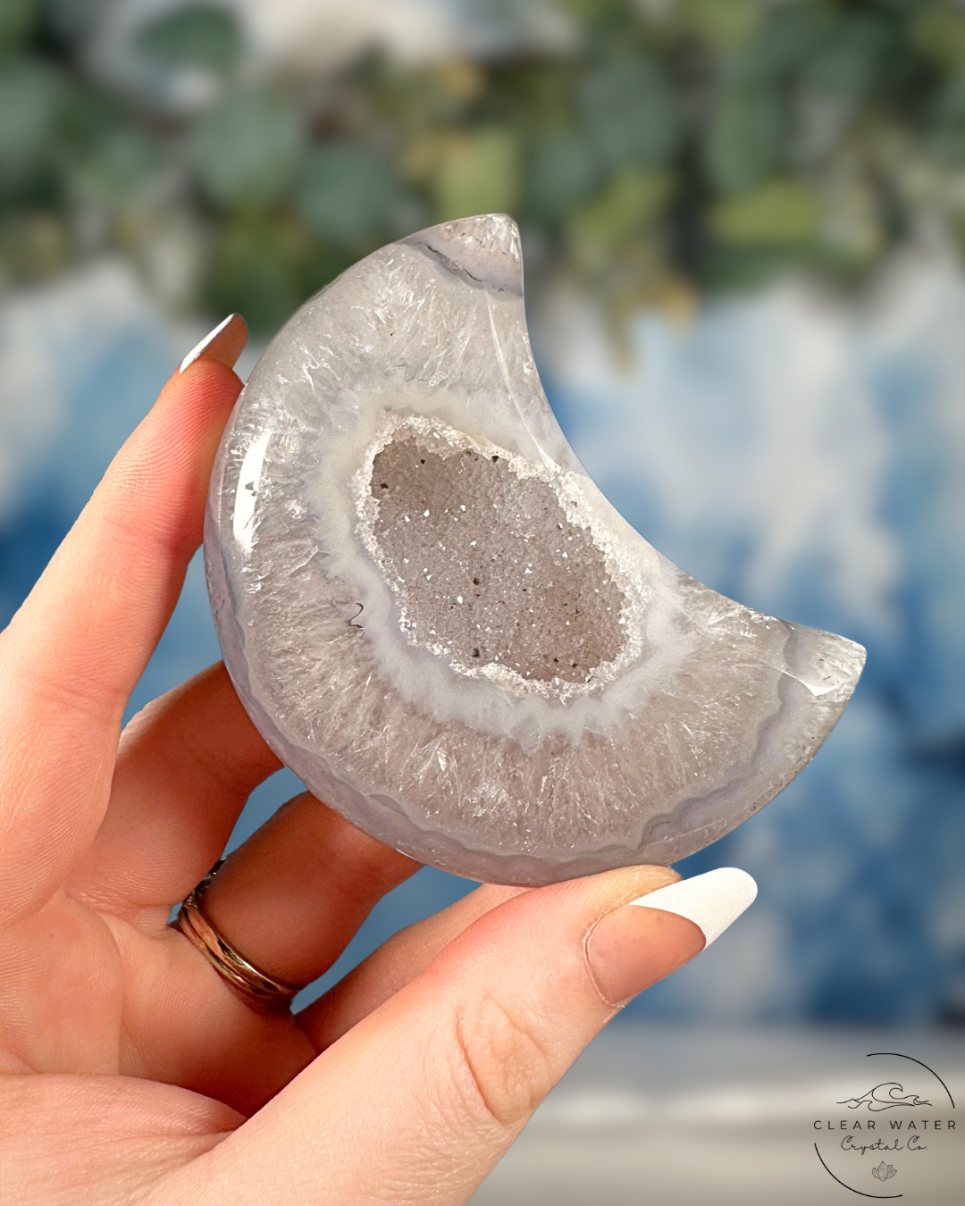 Celestial Captivation: Brazilian Druzy Agate Moon on Stand
