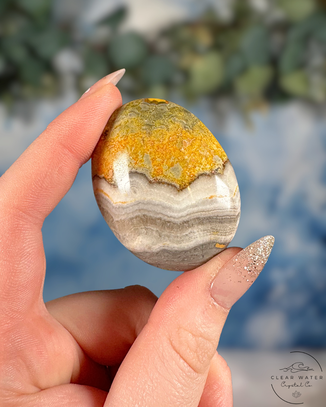 Indonesian Bumblebee Jasper Palmstone: Vibrant Volcanic Art