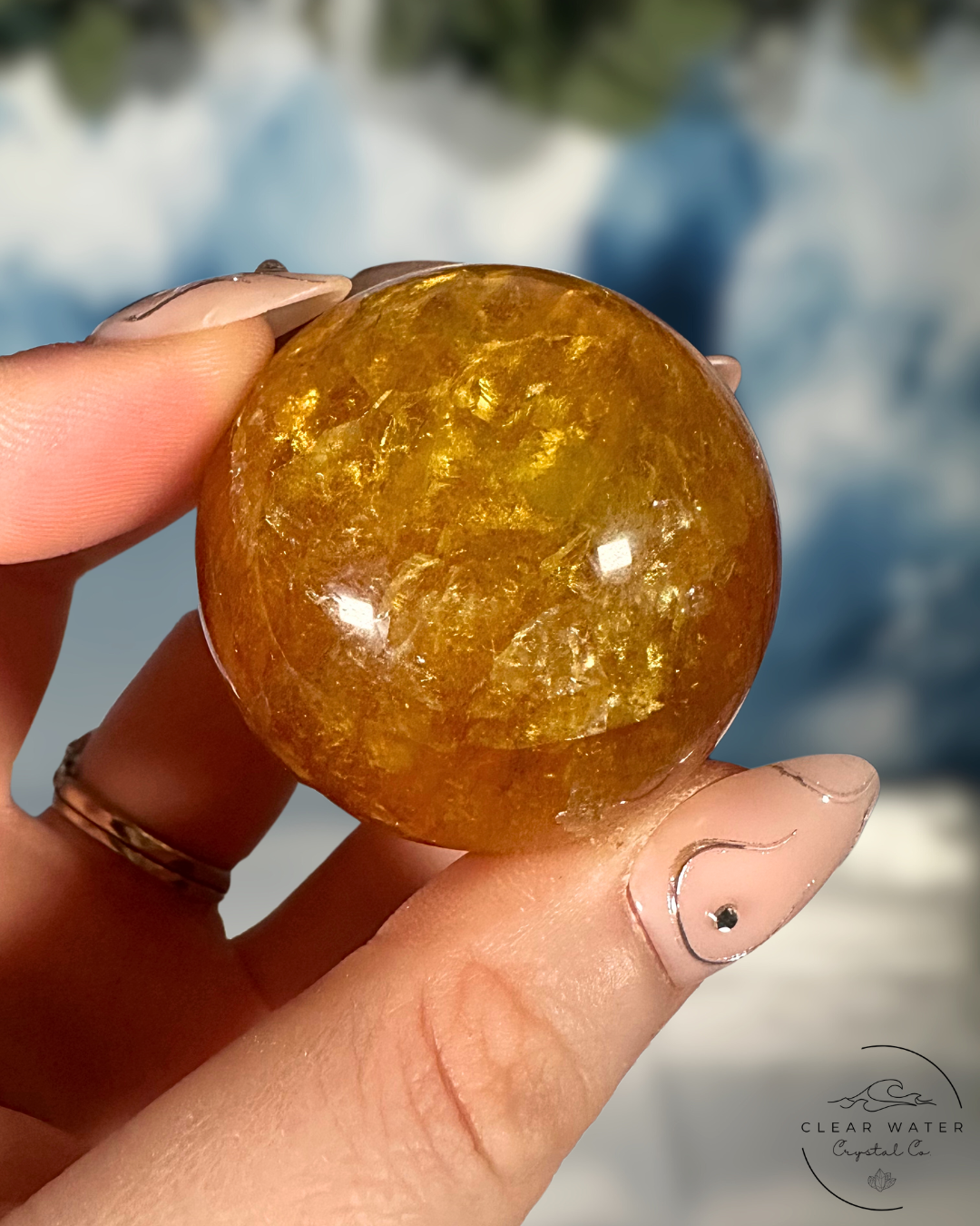 Golden Radiance: Yellow Fluorite with Mica Spheres