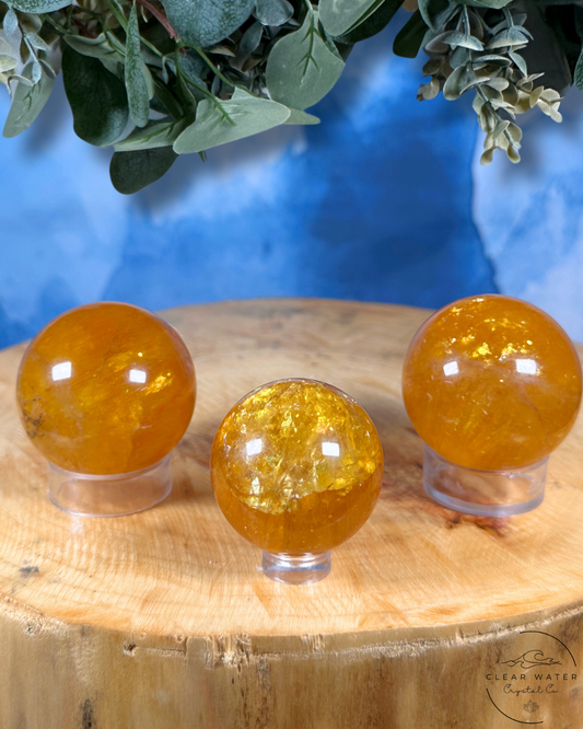 Golden Radiance: Yellow Fluorite with Mica Spheres
